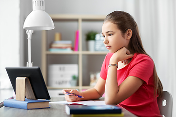 Image showing student girl with tablet pc learning at home