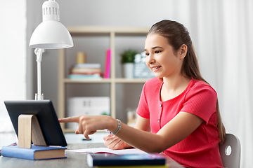 Image showing student girl with tablet pc learning at home