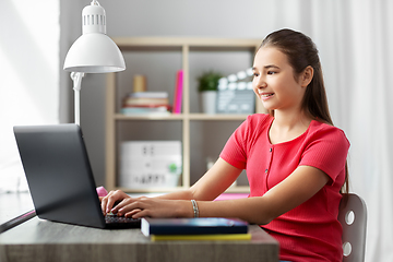 Image showing student girl with laptop computer learning at home