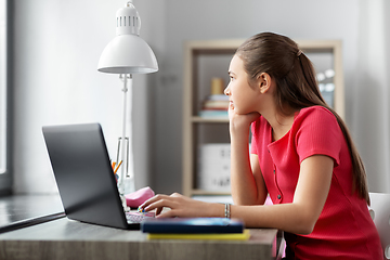 Image showing student girl with laptop computer learning at home