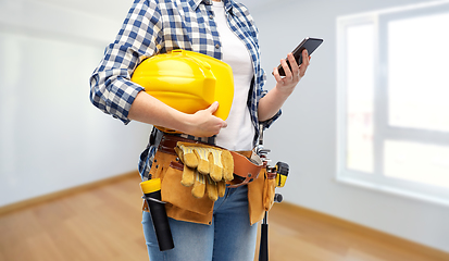 Image showing woman or builder with phone and working tools