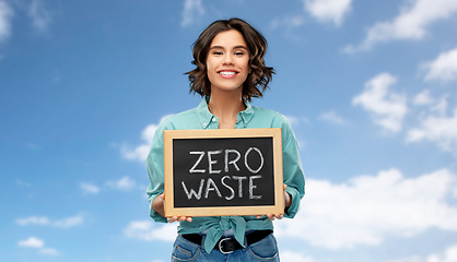 Image showing happy woman with chalkboard with zero waste words