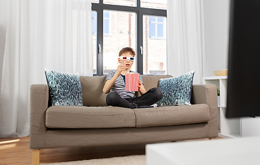 Image showing boy in 3d movie glasses and watching tv at home