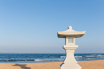 Image showing Stone lantern in the beach