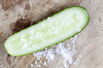 Image showing salt on half a cucumber