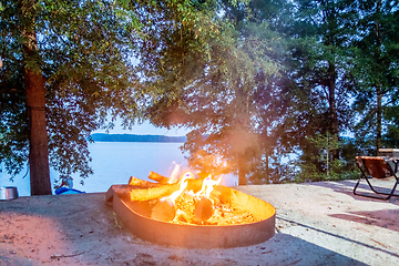 Image showing camping bon fire by the lake