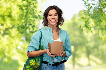 Image showing happy woman with food in reusable net bag and wok