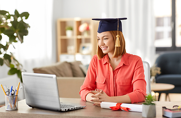 Image showing student woman with laptop and diploma at home