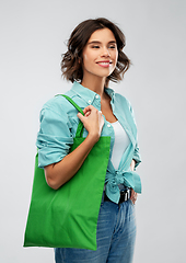 Image showing woman with reusable canvas bag for food shopping