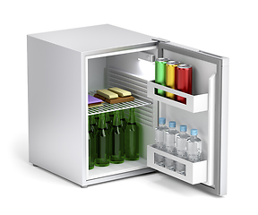 Image showing Minibar refrigerator with drinks and snacks