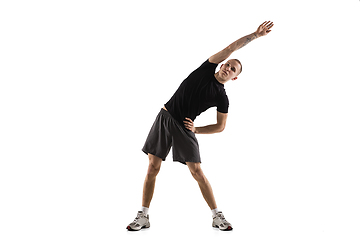 Image showing Young caucasian male model in action, motion isolated on white background. Concept of sport, movement, energy and dynamic, healthy lifestyle. Training, practicing.