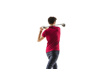 Image showing Golf player in a red shirt taking a swing isolated on white studio background