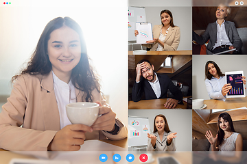 Image showing Young colleagues talking, working in videoconference with co-workers at office or living room. Online business, education during quarantine.