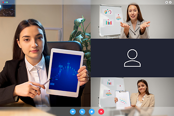 Image showing Young women talking, working in videoconference with co-workers at office or living room. Online business, education during quarantine.