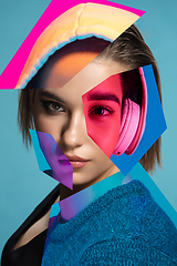 Image showing Young woman\'s portrait made of different pieces of faces, modern art collage. New vision of beauty and fashion, make up, hairstyle.