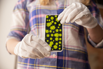 Image showing Viruses on surfaces, smartphone you contacting everyday - concept of spreading of virus, disinfection