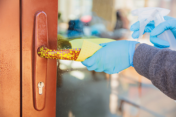 Image showing Viruses on surfaces, door and window knobs you contacting everyday - concept of spreading of virus, disinfection