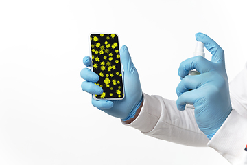 Image showing Viruses on surfaces, smartphone you contacting everyday - concept of spreading of virus, disinfection