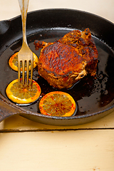 Image showing pork chop seared on iron skillet