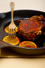 Image showing pork chop seared on iron skillet