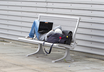 Image showing Tired man taking a break