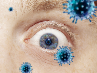 Image showing Close up shoot of a male eye with 3D-illustrated coronavirus models, the way of infecting