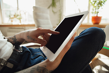 Image showing Close up of male hands using tablet with blank screen, copyspace, education and business concept