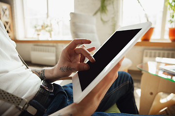 Image showing Close up of male hands using tablet with blank screen, copyspace, education and business concept