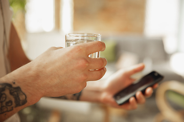 Image showing Close up of male hands using smartphone, education and business concept