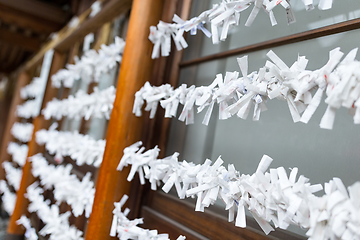 Image showing Fortune teller paper strip in Japanese temple