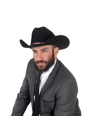 Image showing Portrait of man in a suit and cowboy hat