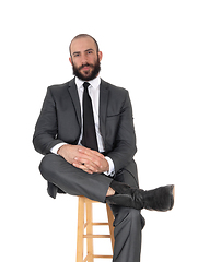 Image showing Relaxing business man sitting on a chair