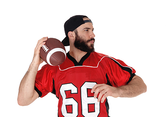 Image showing Closeup of a football player with his football in his hand