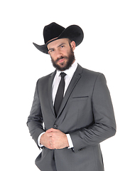 Image showing Portrait of man in a suit and cowboy hat