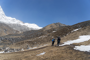 Image showing Tourists himing in trek of Nepal