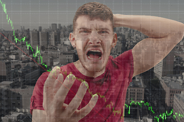 Image showing Stressed man holding head with hands on abstract city background. Double exposure with graphs. Virus alert, coronavirus pandemic, crisis, unemployment