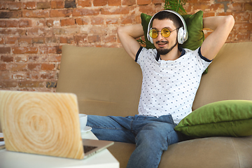 Image showing Man working from home during coronavirus or COVID-19 quarantine, remote office concept