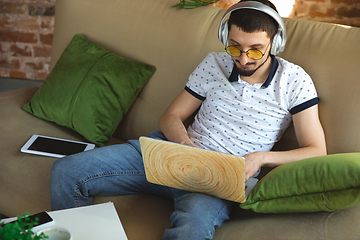 Image showing Man working from home during coronavirus or COVID-19 quarantine, remote office concept