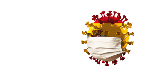 Image showing 3D-illustration of COVID-19 coronavirus colored in national Spain flag in face mask, concept of pandemic spreading