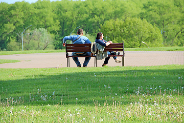 Image showing Man and woman had fight. Couple enjoying summer dandelions