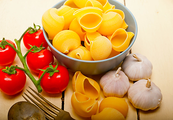 Image showing Italian snail lumaconi pasta with tomatoes