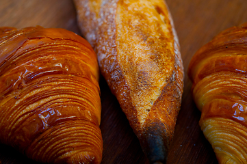 Image showing French fresh croissants and artisan baguette tradition