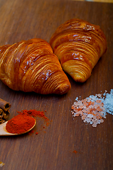 Image showing french traditiona croissant brioche butter bread  on wood