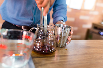 Image showing Barista making a drip coffee in cafe