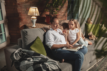 Image showing Mother and daughter during self-insulation at home while quarantined, family time cozy and comfort