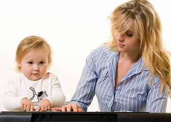 Image showing Learning to play keyboard