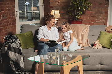 Image showing Mother and daughter during self-insulation at home while quarantined, family time cozy and comfort