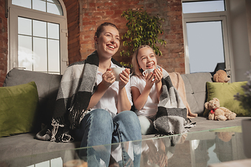 Image showing Mother and daughter during self-insulation at home while quarantined, family time cozy and comfort