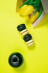 Image showing Monochrome stylish composition in yellow color. Top view, flat lay.