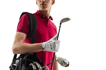 Image showing Golf player in a red shirt training, practicing isolated on white studio background